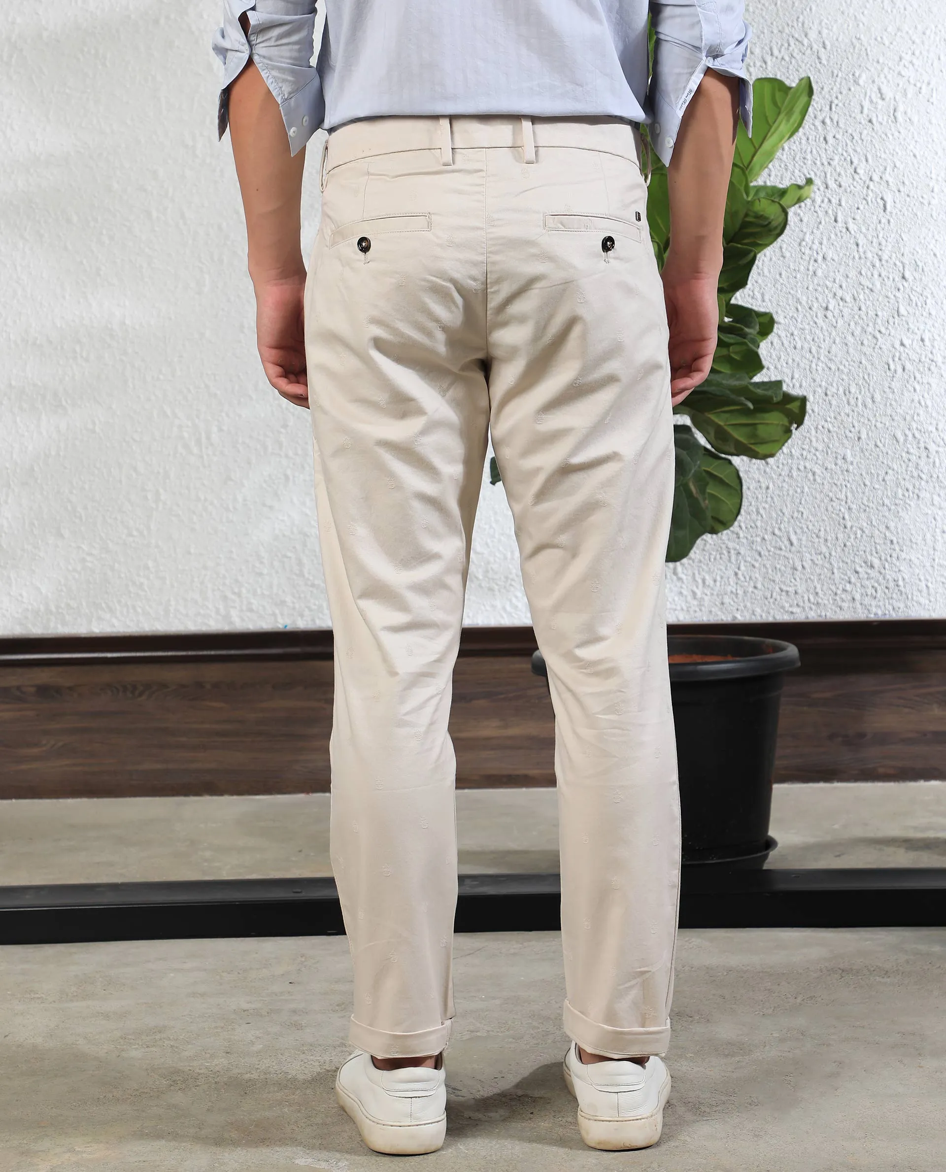 Rare Rabbit Men'S Mazzios Beige Solid Mid-Rise Regular Fit Stretch Trouser